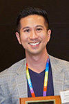 Tuan Huynh receiving a preceptor of the year award
