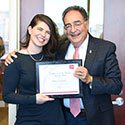 Hilary Edwards poses with Dr. Jay Perman for photo during Employee of the Month celebration.